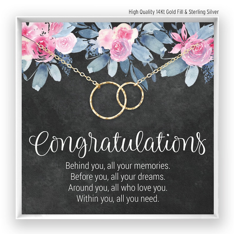 A linked circles necklace comes on a jewelry card with a message, poem or quote.  The necklace has either smooth or hammered circles that are attached together. The congratulations card is the perfect gift with a meaningful graduation message