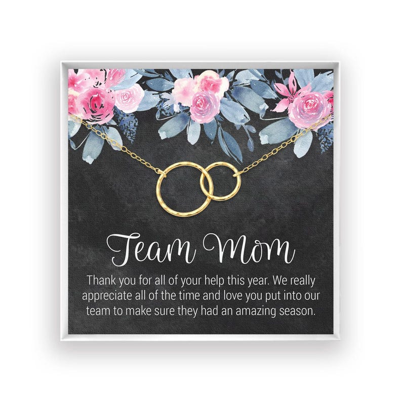 The image is a framed print with a floral design and a message expressing gratitude to a team mom for her support and love throughout the year.