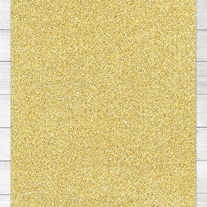 May include: A gold glitter background with a fine, sparkly texture.