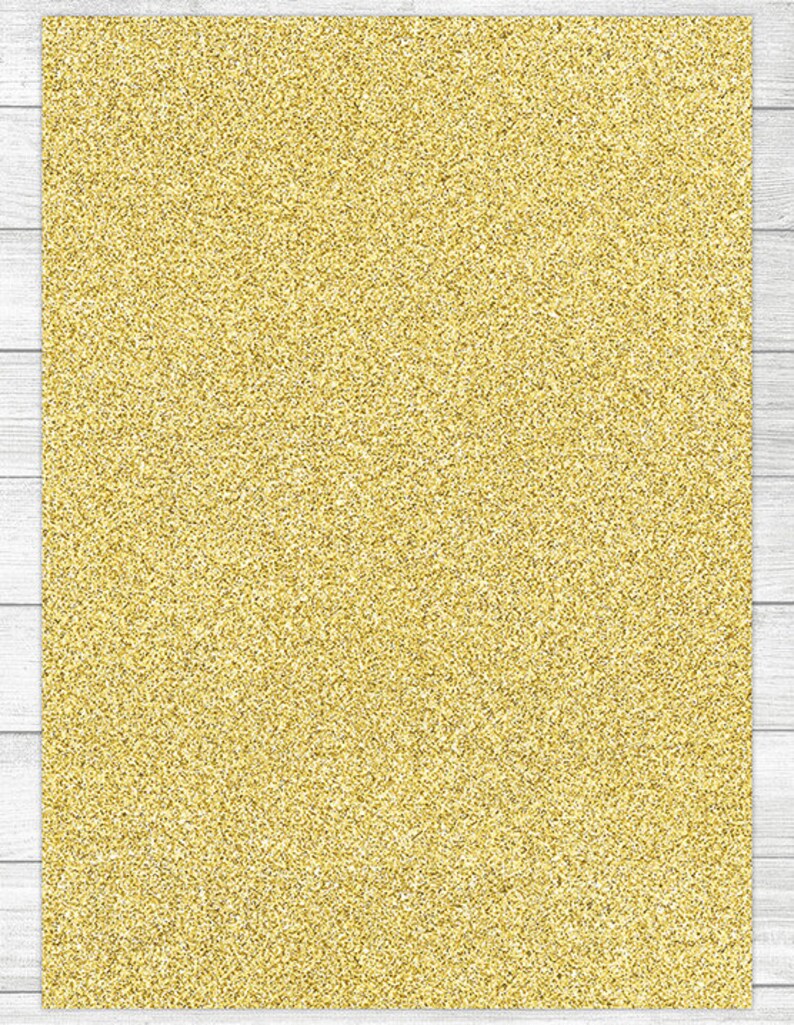 May include: A gold glitter background with a fine, sparkly texture.