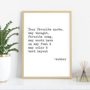 May include: A framed print with a beige frame and a white background. The print features a black and white typewriter font quote that reads "Your favorite quote, any thought, favorite song, any words here in any font & any color & text layout -author".