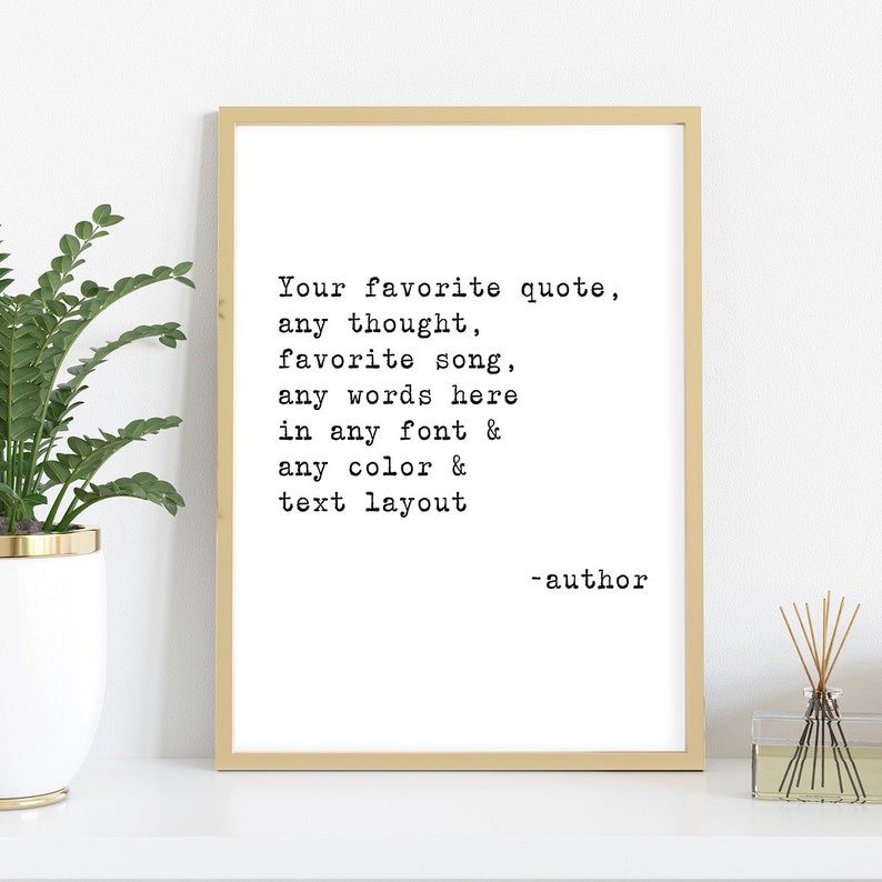 May include: A framed print with a beige frame and a white background. The print features a black and white typewriter font quote that reads "Your favorite quote, any thought, favorite song, any words here in any font & any color & text layout -author".