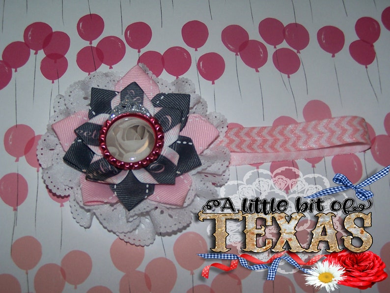 Beautiful Eyelet Flower with 3 layer bow on top with bottle cap image
