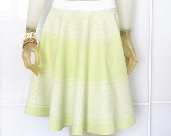 Swinging green and white circle skirt made of vintage cotton