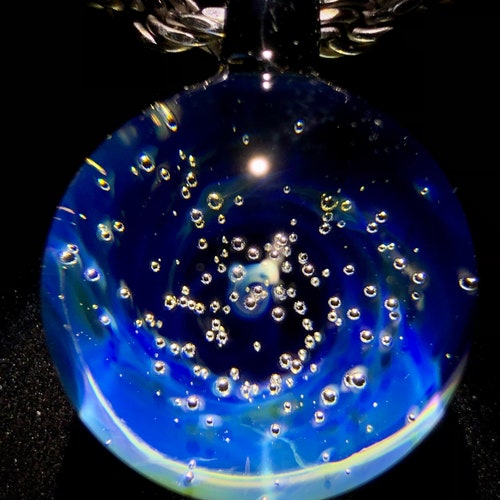 Icy silver galaxy pendant made with shops pure silver by artist Anthony Weber