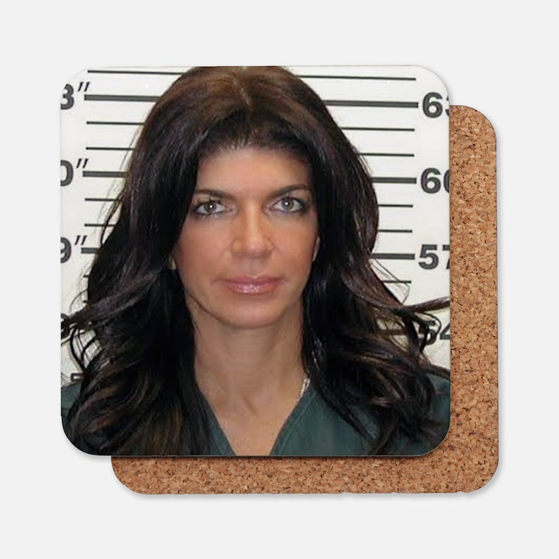 May include: A mugshot of a woman with long dark hair. She is wearing a green jumpsuit and is standing in front of a white wall with black lines. The numbers 6'0" and 5'7" are visible on the wall.
