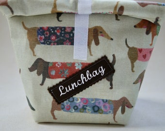 Lunchbag, Lunchbox Motiv Dackel, Hunde, Wachstuchtasche, Brotzeitbeutel, Vespertasche mit Aufnäher Lunchbag beige-bunt