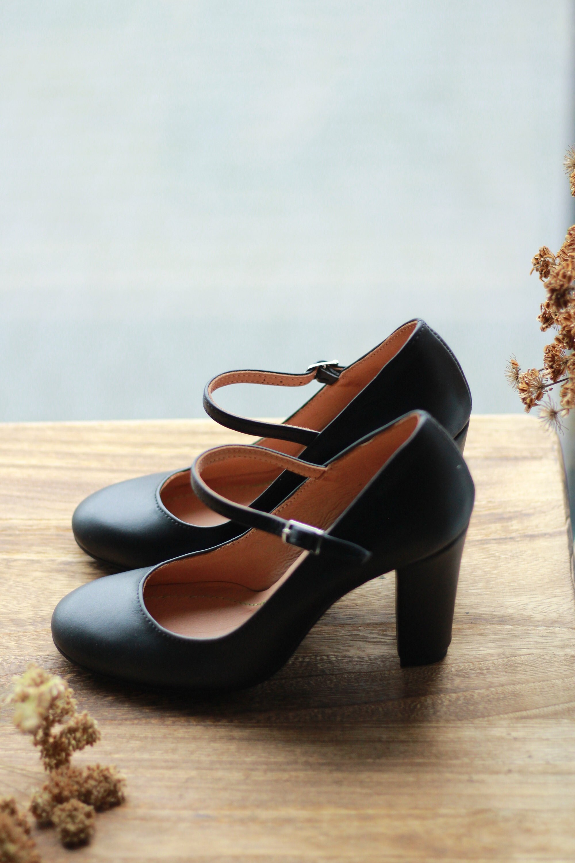 black leather mary jane heels