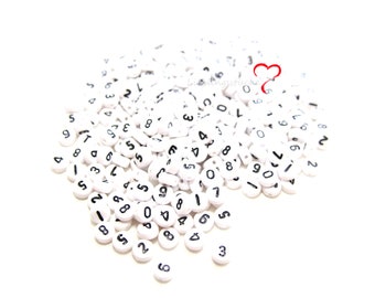 10 number beads *of your choice* with black writing