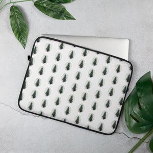Custodia per laptop/tablet con alberi di pino ovunque