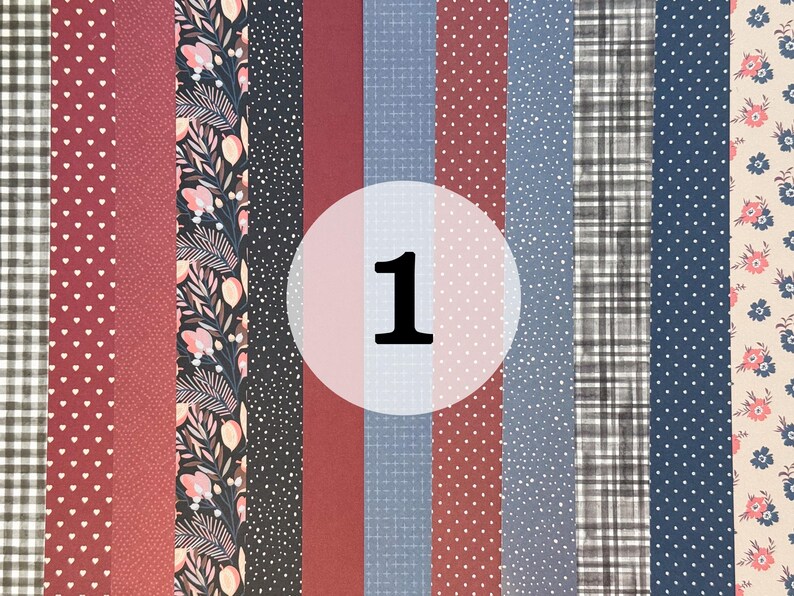 May include: A collection of 10 different patterned fabric strips in various shades of red, blue, and black. The strips are arranged vertically and feature patterns such as polka dots, plaid, floral, and geometric designs.