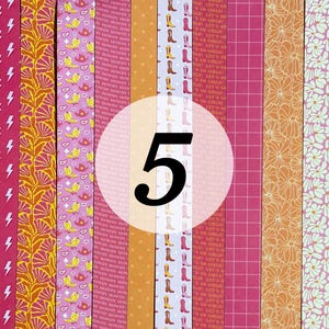 May include: A set of five patterned washi tapes. The tapes feature a variety of designs, including lightning bolts, floral patterns, and geometric shapes. The tapes are all in shades of pink, orange, and white.