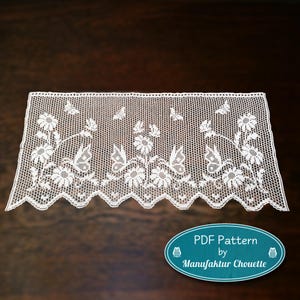 May include: White lace curtain panel featuring a floral and butterfly design. The intricate pattern includes daisies and butterflies, with a scalloped edge. The text "PDF Pattern by Manufaktur Chouette" is on a teal oval.