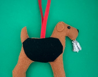 Airedale with a bell