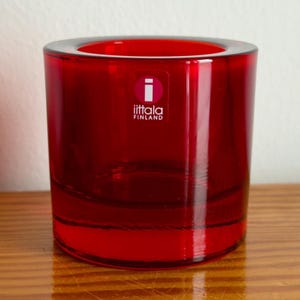 May include: A rustic wooden sign with the text "Welcome to our home" in white lettering. The sign features a distressed finish and a simple, inviting design, perfect for entryway decor.