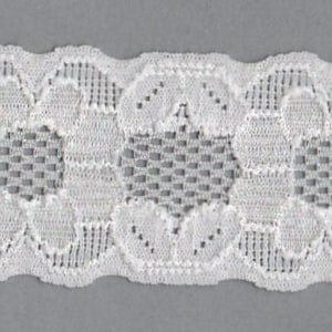 May include: White lace trim with a delicate floral pattern. The lace is approximately 1 inch wide and has a scalloped edge.