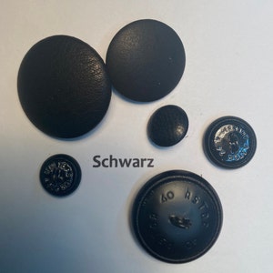 Leather button with metal base