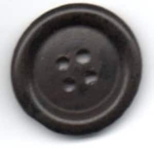 May include: A dark brown plastic button with four holes in a flower shape.