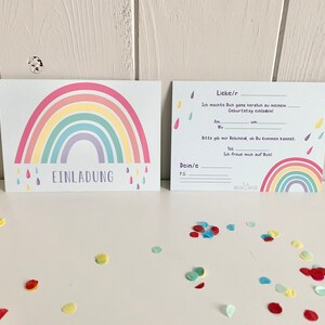 May include: A rainbow-themed birthday invitation with a colorful rainbow and raindrops. The text reads "Liebe/r" and "Ich m&ouml;chte Dich ganz herzlich zu meinem Geburtstag einladen!"