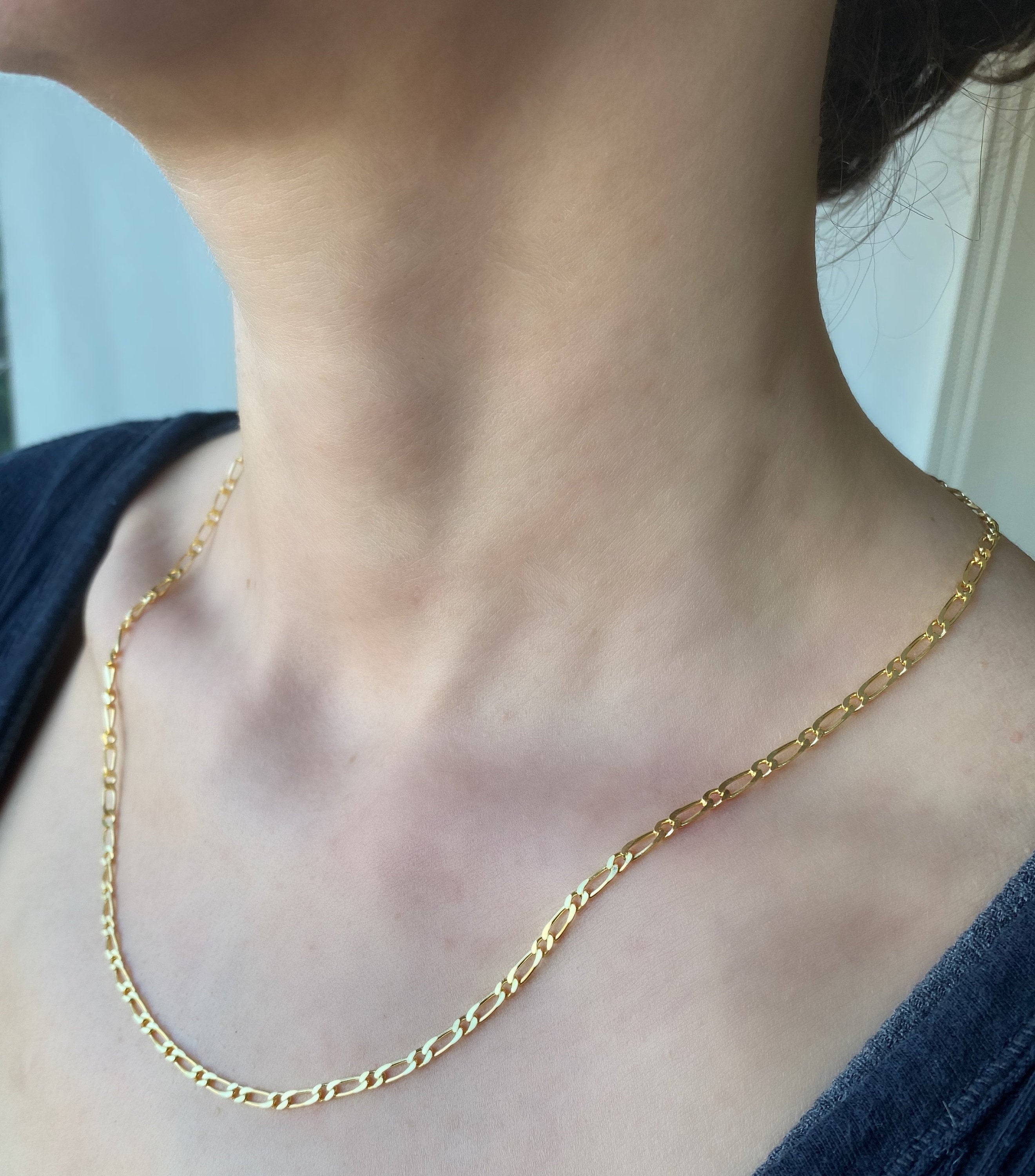 Gold over silver figaro chain deals