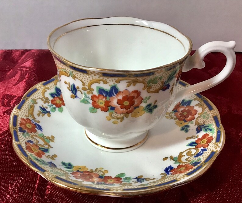 Royal Albert Crown China Cup And Saucer Blue Orange And Yellow Etsy