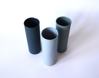 Narrow porcelain vase, cylinder in shades of blue