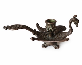 Candelabro de bronce con forma de pavo real, estilo Art Nouveau.