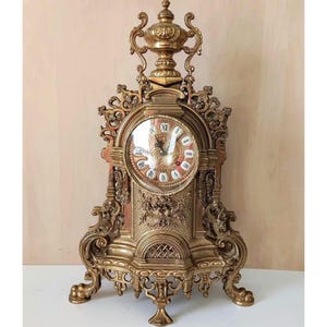 Antique Louis XVI, ormolu style mantel clock, Italy, polished brass
