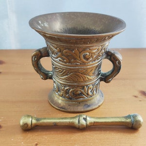 Vintage solid brass mortar and pestle for grinding spices and herbs, rustic kitchen decor