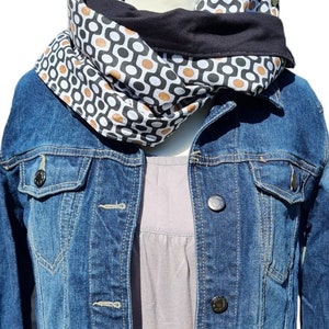 Loop, Flexxloop, Schal, 3 in 1, schwarzer Jersey und schwarze Baumwolle mit goldfarbenen und weißen Formen