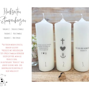 May include: Three white pillar candles with different designs on the back. The first candle has a cross, heart, and anchor. The second candle has a cross, heart, and anchor. The third candle has the text "DUE LIEBE H&Ouml;RT NIEMALS AUF (KORINTHIER 13.13)".
