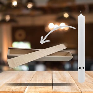 May include: A white candle in a wooden box. The candle is 40 inches tall and the box is made of light wood. The candle is labeled "40/4".