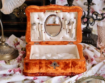 Rare and fabulous 19th century victorian jewelry / vanity - sewing box in orange velvet filled with ivory tufted silk, oval beveled mirror