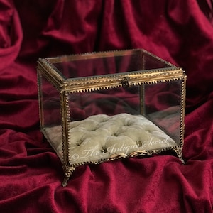 French 19th century antique jewelry reliquary box , bridal casket in ormolu, beveled glass and beige tufted velvet