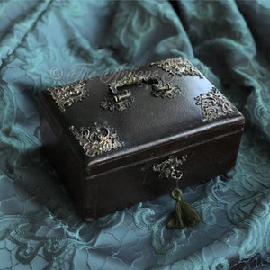 Beautiful antique Napoleon III sewing / jewelry box in brown leather, art nouveau brass embellishments and blue tufted silk interior