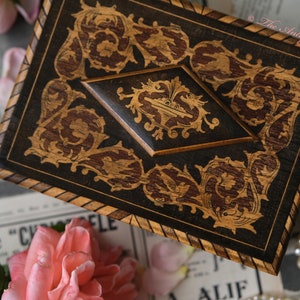 Gorgeous antique early 1900s Italian Sorrento jewelry box with florentine inlay work and deep purple tufted cushion