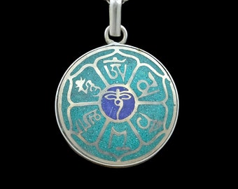 Verziertes, buddhistisches Amulett aus Nepal, türkis, blau, silbern, Mantra, Augen Buddhas