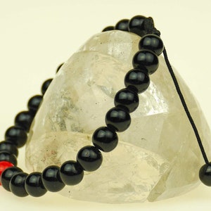 Bracelet black onyx Ø 8mm threaded coral s44