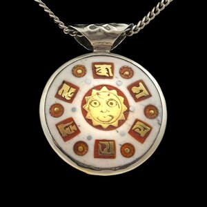 Beautiful Buddhist amulet from Nepal, colorful, round, with OM symbol, sun and mantra, double-sided image 5