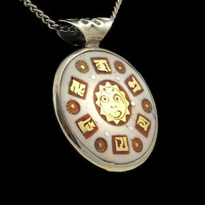 Beautiful Buddhist amulet from Nepal, colorful, round, with OM symbol, sun and mantra, double-sided image 1