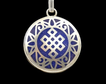 Handcrafted Buddhist amulet with the infinite knot and a mandala from Nepal, blue, silver, round