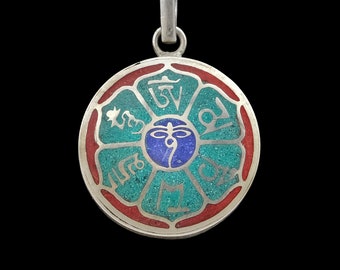 Beautiful decorated Buddhist amulet from Nepal, red, turquoise, blue, silver, mantra, eyes of Buddha