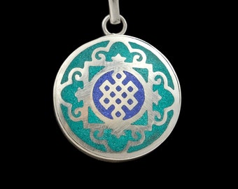 Handmade Buddhist amulet with the infinite knot and a mandala from Nepal, turquoise, blue, silver, round