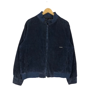May include: A dark blue corduroy jacket with a zip fastening and a small "Baracuta" logo on the right chest.