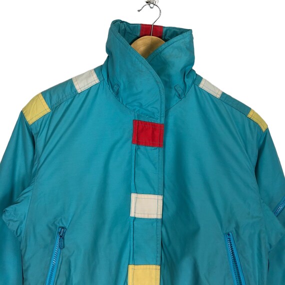 stone  ヴィンテージ　Mountain jacket FW21 The North Face x Kaws Retro 1986 Mountain Jacket Ice