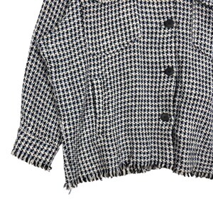 May include: A white and blue checkered jacket with a frayed hem and black buttons.