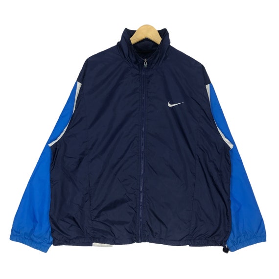 navy blue and white nike windbreaker