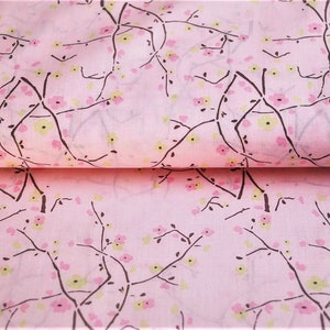 May include: Pink fabric with a repeating pattern of black branches and pink and yellow flowers.