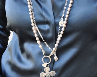 Cross pendant silver on long pearl necklace