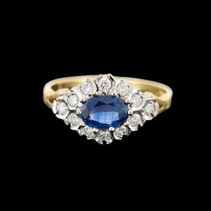 Vintage 18ct Yellow & White Gold Sapphire and Diamond Cluster Ring on black background